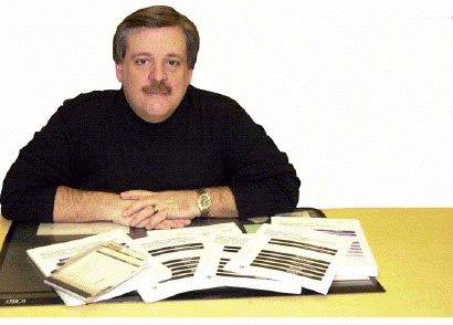 Don Wright at his desk